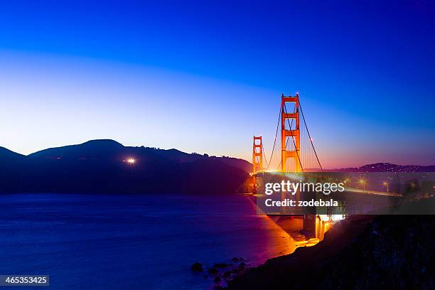 beautiful view of san francisco golden gate bridge at dusk - golden gate bridge night stock pictures, royalty-free photos & images