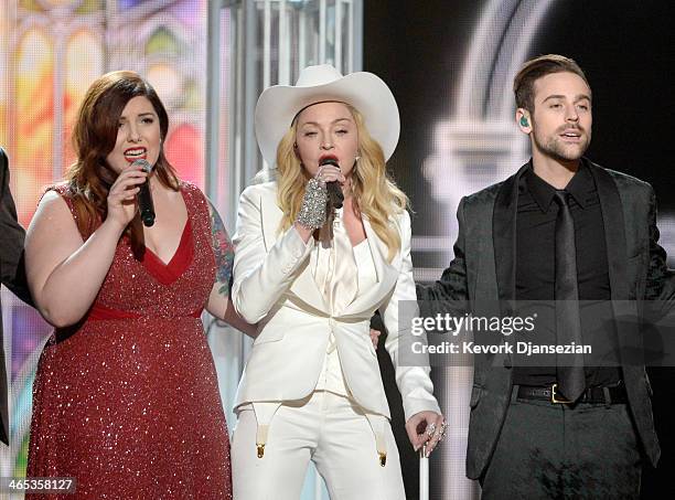 Singers Mary Lambert and Madonna and musician Ryan Lewis perform onstage during the 56th GRAMMY Awards at Staples Center on January 26, 2014 in Los...