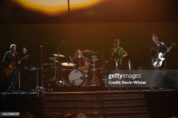 Musical group Queens of the Stone Age perform with Nine Inch Nails onstage during the 56th GRAMMY Awards at Staples Center on January 26, 2014 in Los...