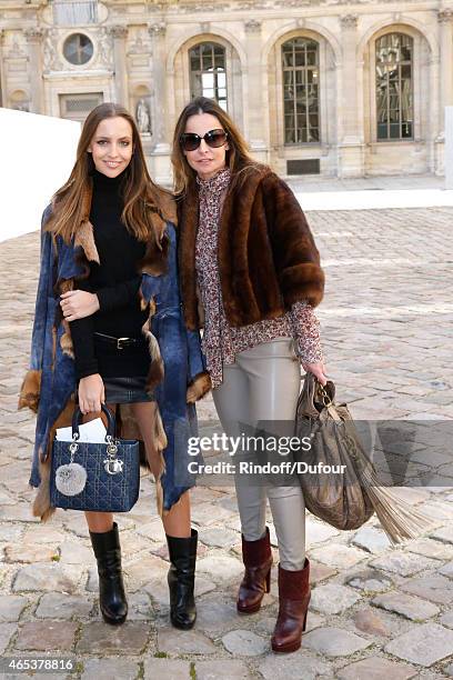 Wife and daughter of David Ginola attend the Christian Dior show as part of the Paris Fashion Week Womenswear Fall/Winter 2015/2016 on March 6, 2015...