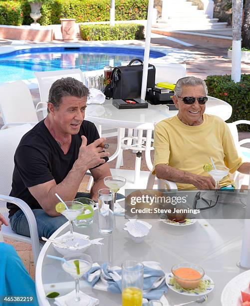 Sylvester Stallone and Miguel Aleman V. Relax before the dinner to celebrate the 9th Annual Acapulco Film Festival at the residence of Mr. Aleman on...