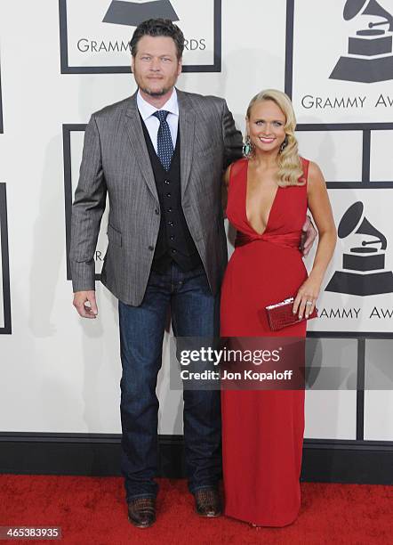 Singers Blake Shelton and wife Miranda Lambert arrive at the 56th GRAMMY Awards at Staples Center on January 26, 2014 in Los Angeles, California.