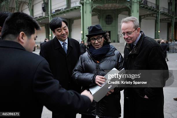 Zhai Jun, Pierre Giner and Renaud Donnedieu de Vabres attend the 'Nuit De La Chine' rehearsal at the Grand Palais on January 26, 2014 in Paris,...