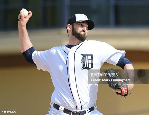 Josh Zeid of the Detroit Tigers pitches during the Spring Training game against the Baltimore Orioles at Joker Marchant Stadium on March 3, 2015 in...