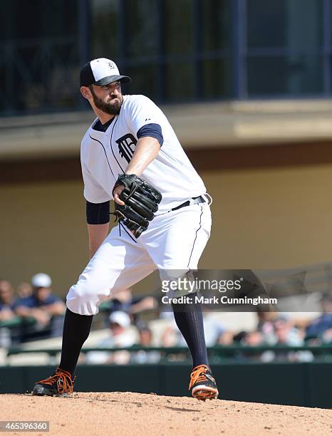 Josh Zeid of the Detroit Tigers pitches during the Spring Training game against the Baltimore Orioles at Joker Marchant Stadium on March 3, 2015 in...