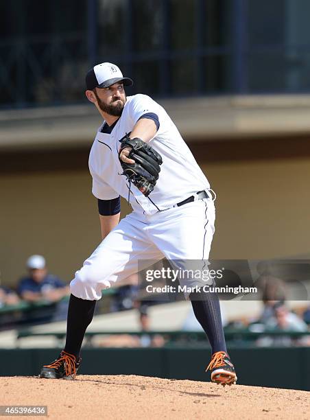 Josh Zeid of the Detroit Tigers pitches during the Spring Training game against the Baltimore Orioles at Joker Marchant Stadium on March 3, 2015 in...