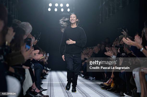 Designer Alexander Wang walks the runway after the Balenciaga show as part of the Paris Fashion Week Womenswear Fall/Winter 2015/2016 on March 6,...