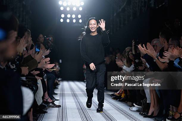 Designer Alexander Wang walks the runway after the Balenciaga show as part of the Paris Fashion Week Womenswear Fall/Winter 2015/2016 on March 6,...