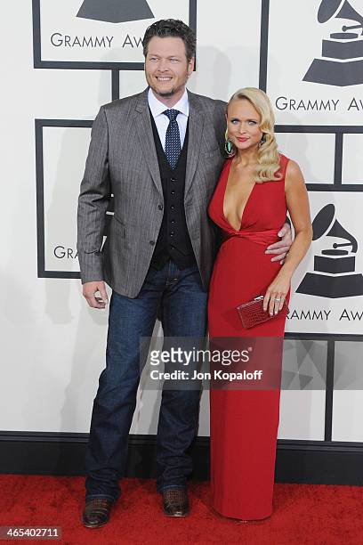 Singers Blake Shelton and wife Miranda Lambert arrive at the 56th GRAMMY Awards at Staples Center on January 26, 2014 in Los Angeles, California.