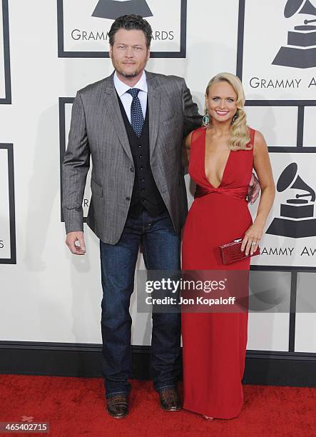 Singers Blake Shelton and wife Miranda Lambert arrive at the 56th GRAMMY Awards at Staples Center on January 26, 2014 in Los Angeles, California.