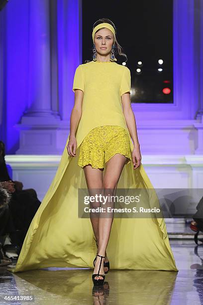 Model walks the runway during the Giada Curti fashion show at Santo Spirito in Sassia as part of AltaRoma Fashion Week Spring/Summer 2014 on January...