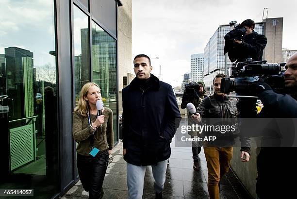 Former Dutch-Moroccan K-1 heavyweight kick-boxing champion Badr Hari arrives at the courthouse in Amsterdam, Netherlands, on January 27, 2014. Hari...