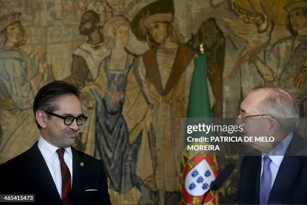 Portuguese Foreign Minister Rui Manchete poses with his Indonesian counterpart Marty Natalegawa's after their meeting at Necessidades Palace on...