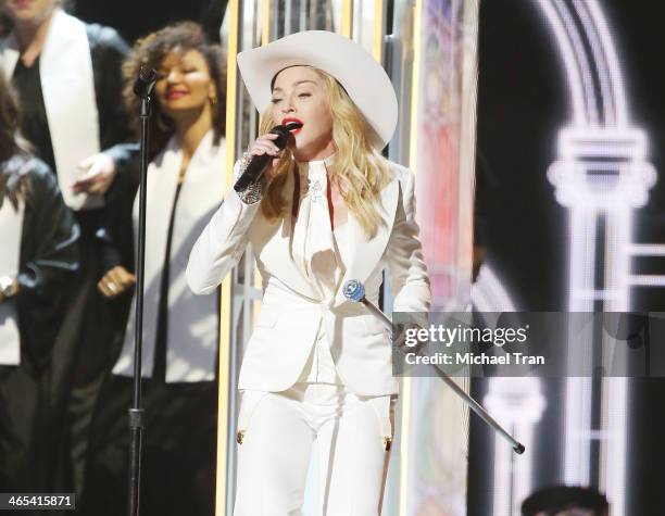 Madonna performs onstage during the 56th GRAMMY Awards held at Staples Center on January 26, 2014 in Los Angeles, California.