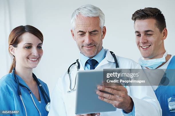 doing research for the next  medical procedure - peopleimages hospital stock pictures, royalty-free photos & images