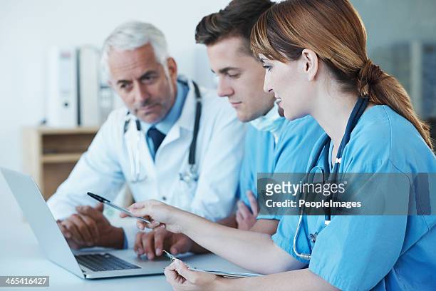 important medical meeting in progress! - peopleimages hospital stock pictures, royalty-free photos & images