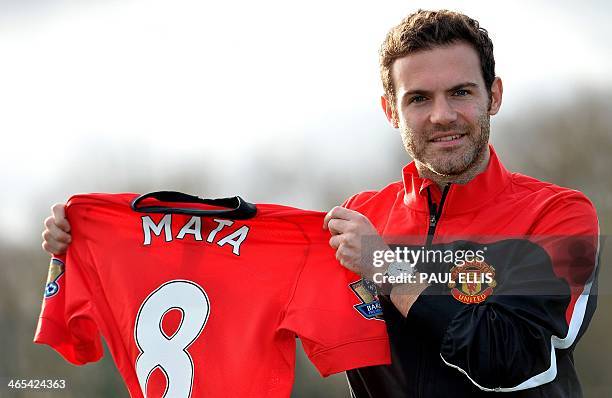 This picture of Juan Mata in a retro Manchester United shirt will