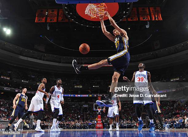 Rudy Gobert of the Utah Jazz dunks the ball against the Philadelphia 76ers at Wells Fargo Center on March 6, 2015 in Philadelphia, Pennsylvania NOTE...