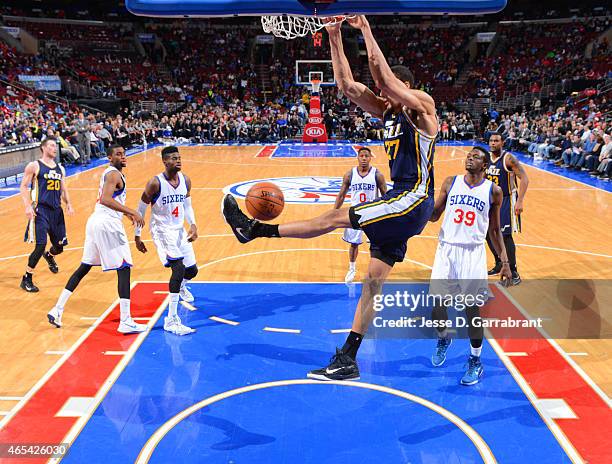 Rudy Gobert of the Utah Jazz dunks the ball against the Philadelphia 76ers at Wells Fargo Center on March 6, 2015 in Philadelphia, Pennsylvania NOTE...