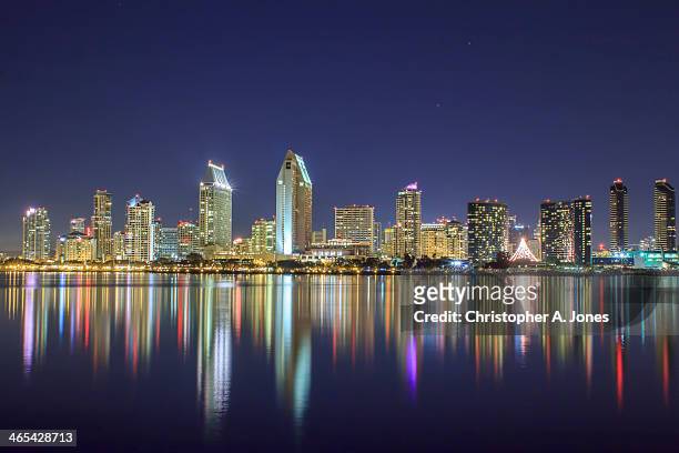 san diego skyline and reflections at night - san diego stock pictures, royalty-free photos & images