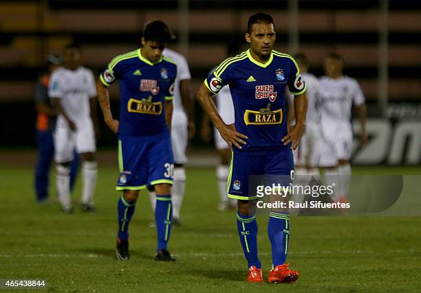 Cesar Pereyra and Luiz da Silva of Sporting Cristal leave the field after a defeat after a match between San Martin and Sporting Cristal as part of...