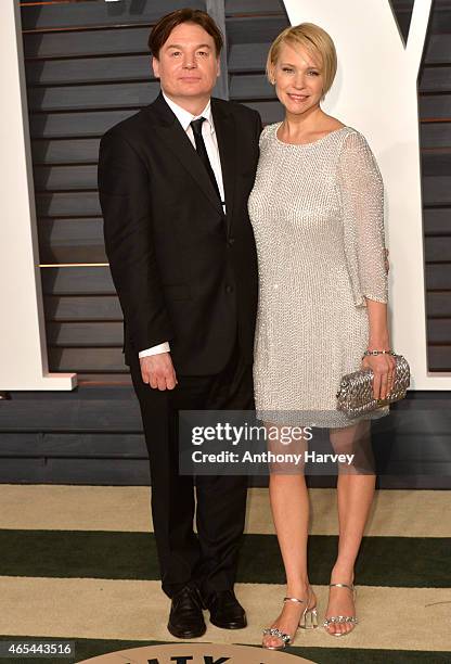 Mike Myers and Kelly Tisdale arrive at the 2015 Vanity Fair Oscar Party Hosted By Graydon Carter at Wallis Annenberg Center for the Performing Arts...