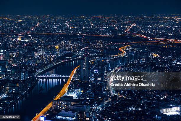 tokyo nightview - city lights reflected on buildings speed stock pictures, royalty-free photos & images