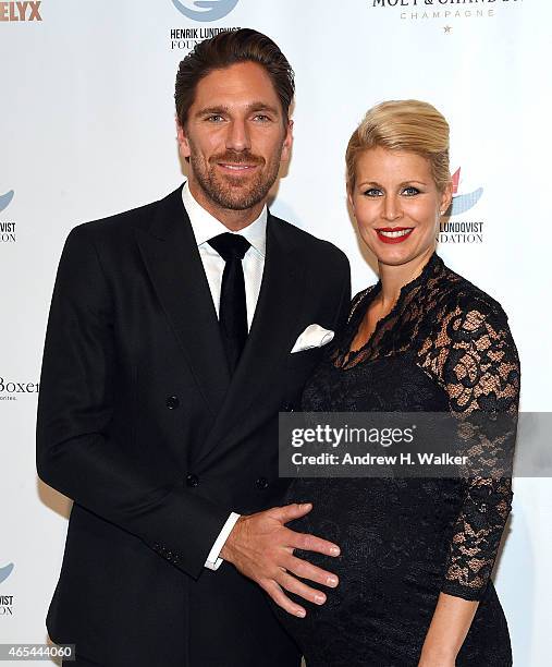 S NY Ranger's goalkeeper Henrik Lundqvist and his wife Therese Andersson attend an evening "Behind The Mask" with the Henrik Lundqvist Foundation at...