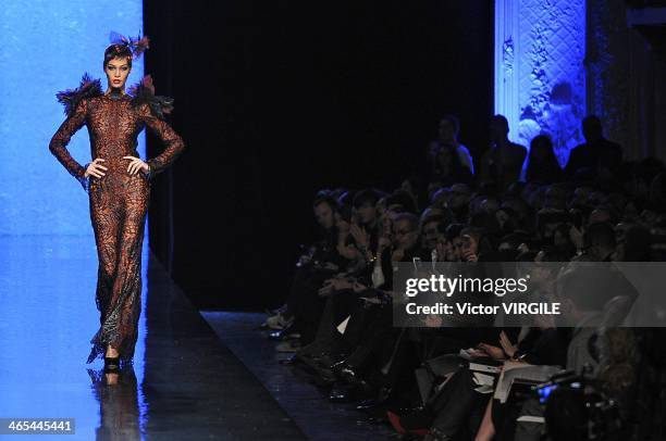 Model walks the runway during Jean Paul Gaultier show as part of Paris Fashion Week Haute Couture Spring/Summer 2014 on January 22, 2014 in Paris,...