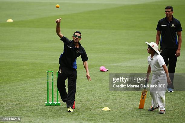 Nasir Hossain and Taskin Ahmed of Bangladesh take part during the ICC Charity Coaching Clinic at the Adelaide Oval on March 7, 2015 in Adelaide,...