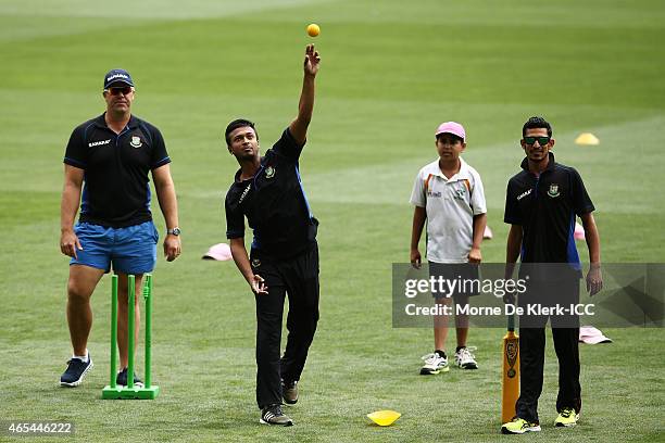 Heath Streak, Shakib Al Hasan, Nasir Hossain of Bangladesh take part during the ICC Charity Coaching Clinic at the Adelaide Oval on March 7, 2015 in...