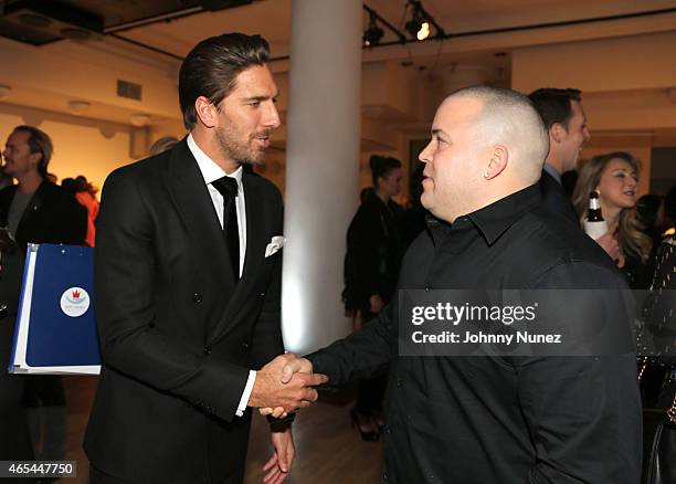 Player Henrik Lundqvist and Johnny Marines attend An Evening "Behind The Mask" with the Henrik Lundqvist Foundation at Helen Mills Theater on March...