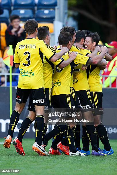 Phoenix players congratulate teammate Nathan Burns on his goal during the round 20 A-League match between the Wellington Phoenix and Adelaide United...