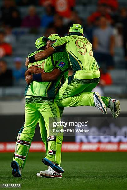 Wahab Riaz of Pakistan celebrates catching out JP Duminy of South Africa during the 2015 ICC Cricket World Cup match between South Africa and...