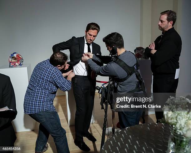 New York Rangers goaltender Henrik Lundqvist prepares to be interviewed by the media during An Evening "Behind The Mask" With The Henrik Lundqvist...