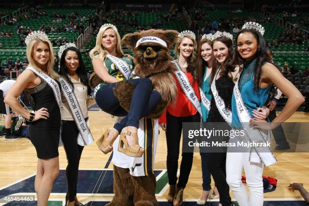 Winners of state Miss pageants and Teen Miss pageants pose with Jazz Bear as holds Angie Layton, Miss Utah before the Utah Jazz and Washington...