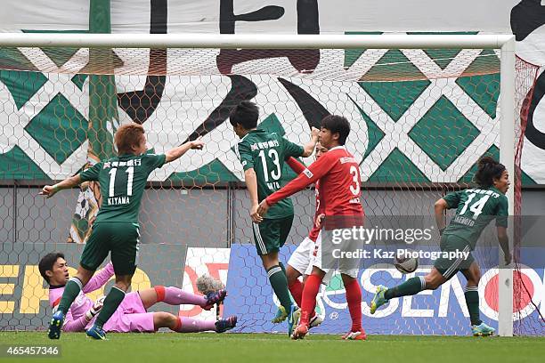 Tomoki Ikemoto of Matsumoto Yamaga scores 2nd goal during the J. League match between Nagoya Grampus and Matsumoto Yamaga at Toyota Stadium on March...