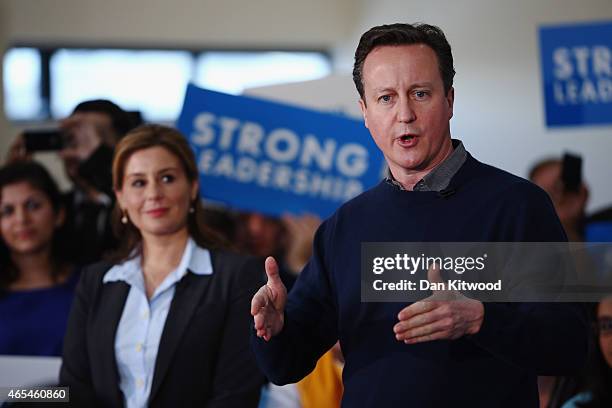 British Prime Minister David Cameron delivers a speech to party supporters at the Dhamecha Lohana Centre on March 7, 2015 in London, England. Mr...