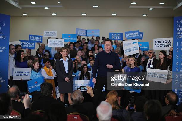 British Prime Minister David Cameron delivers a speech to party supporters at the Dhamecha Lohana Centre on March 7, 2015 in London, England. Mr...