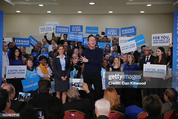 British Prime Minister David Cameron delivers a speech to party supporters at the Dhamecha Lohana Centre on March 7, 2015 in London, England. Mr...