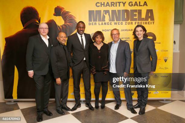 Peter Heinzemann, Anant Singh, Idris Elba, Zindzi Mandela, Helge Sasse and Justin Chadwick attend the Nelson Mandela Gala at the Hotel Adlon on...