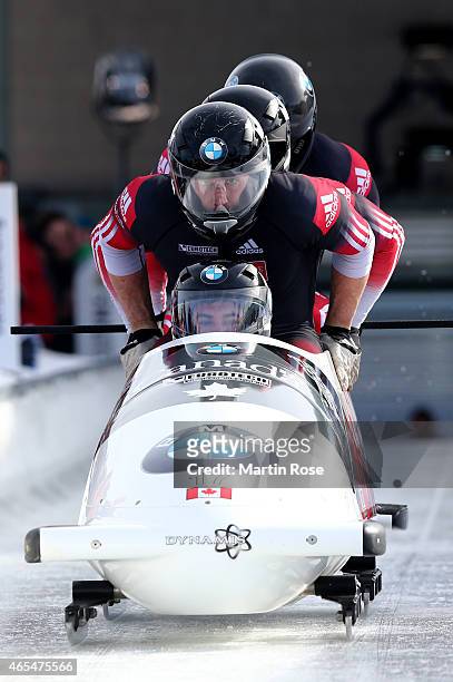 Chris Spring, Derek Plug, Alexander Kopacz and Lascelles Brown of Canada compete in their first run of the four man bob competition during the FIBT...
