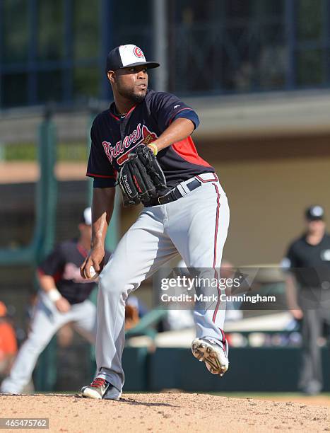 Sugar Ray Marimon of the Atlanta Braves pitches during the Spring Training game against the Detroit Tigers at Joker Marchant Stadium on March 5, 2015...