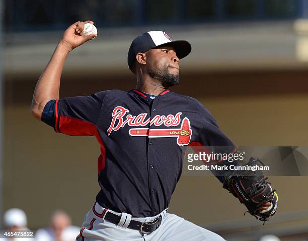 Sugar Ray Marimon of the Atlanta Braves pitches during the Spring Training game against the Detroit Tigers at Joker Marchant Stadium on March 5, 2015...