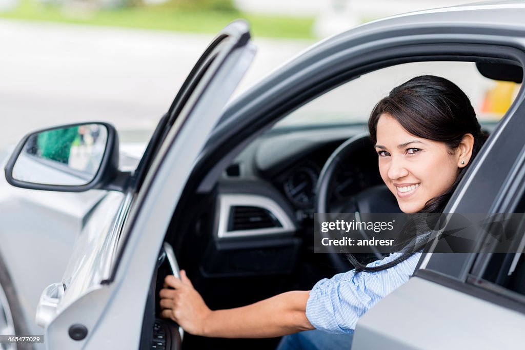 Woman getting in the car