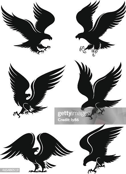 eagle silhouettes - golden eagle stock illustrations