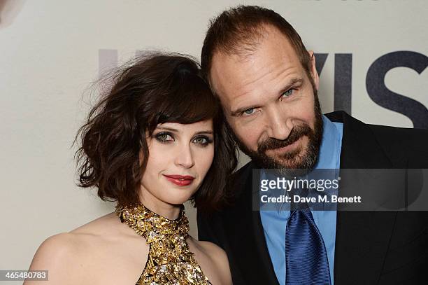 Felicity Jones and Ralph Fiennes attend the UK Premiere of "The Invisible Woman" at the ODEON Kensington on January 27, 2014 in London, England.