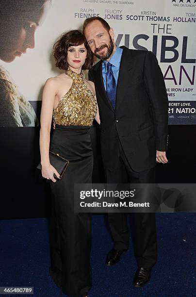 Felicity Jones and Ralph Fiennes attend the UK Premiere of "The Invisible Woman" at the ODEON Kensington on January 27, 2014 in London, England.