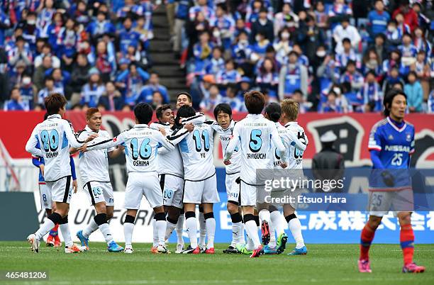 Yu Kobayashi of Kawasaki Frontale celebrates scoring his team's second goal with his team mates during the J. League match between Yokohama F....