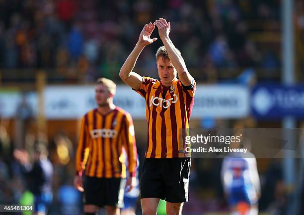 Stephen Darby of Bradford City applauds the fans following their team's 0-0 draw during the FA Cup Quarter Final match between Bradford City and...